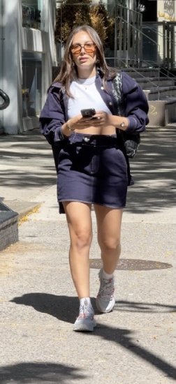 dark blue denim mini skirt and a cropped jacket