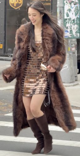 brown fur coat and suede brown boots
