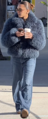 oversized blue fur coat with blue-washed jeans
