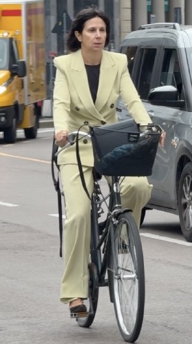 pantsuit, brown heels, and a matching brown tee